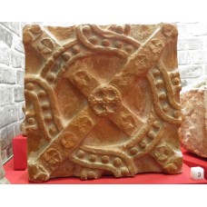 Solar cross on stone, solar disc